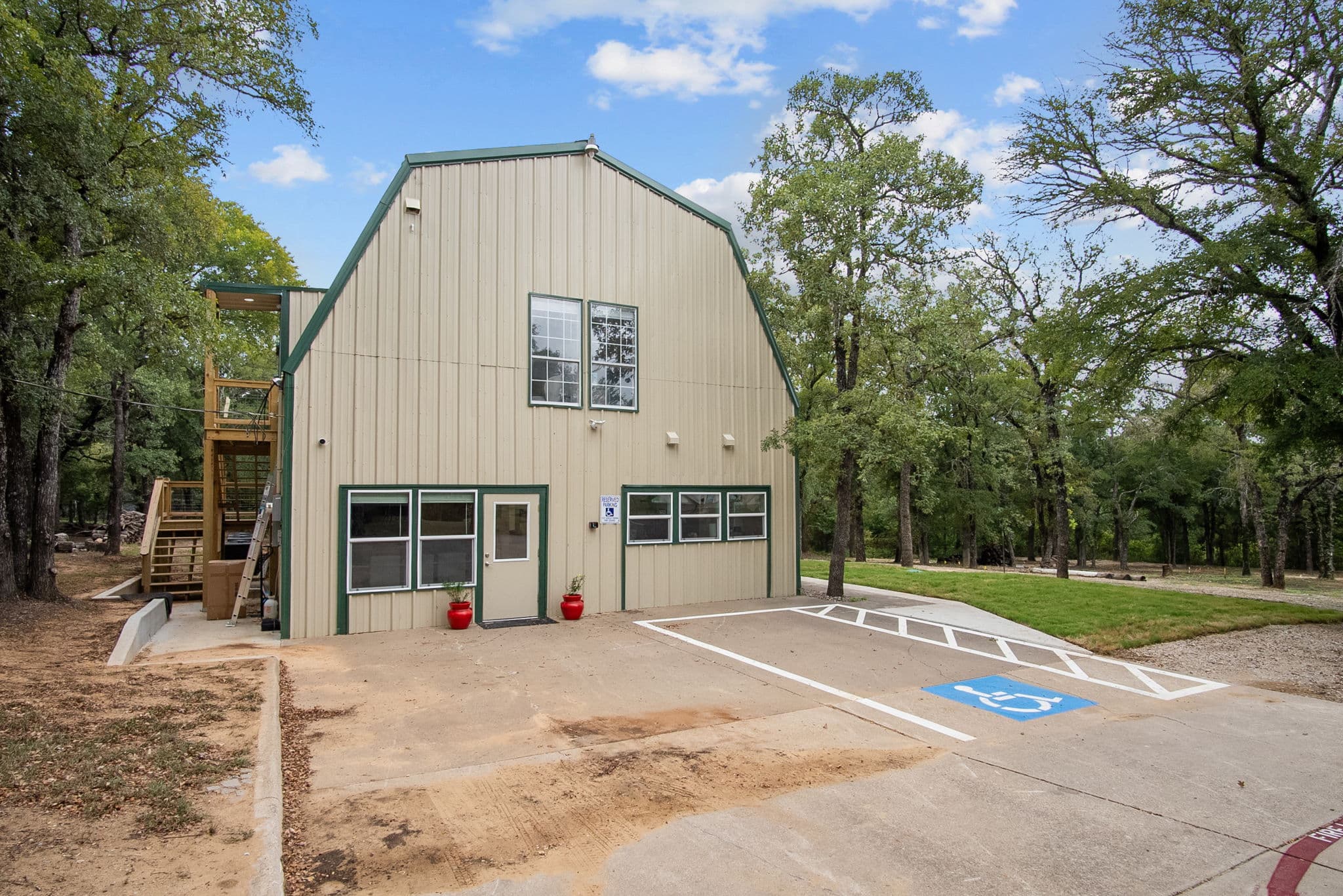 Parking beside the barn residence, including an accessible space