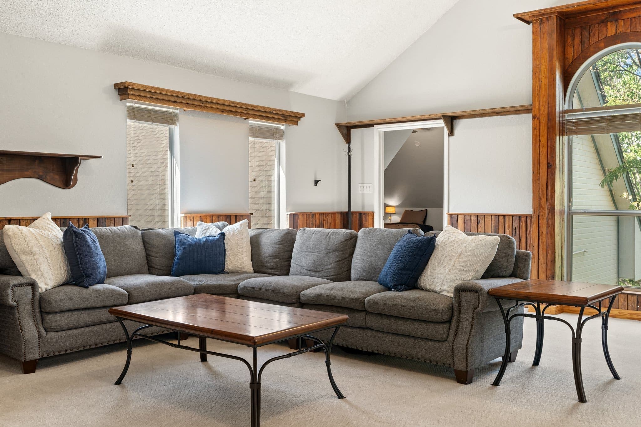 Living room in the main house with a large sectional sofa