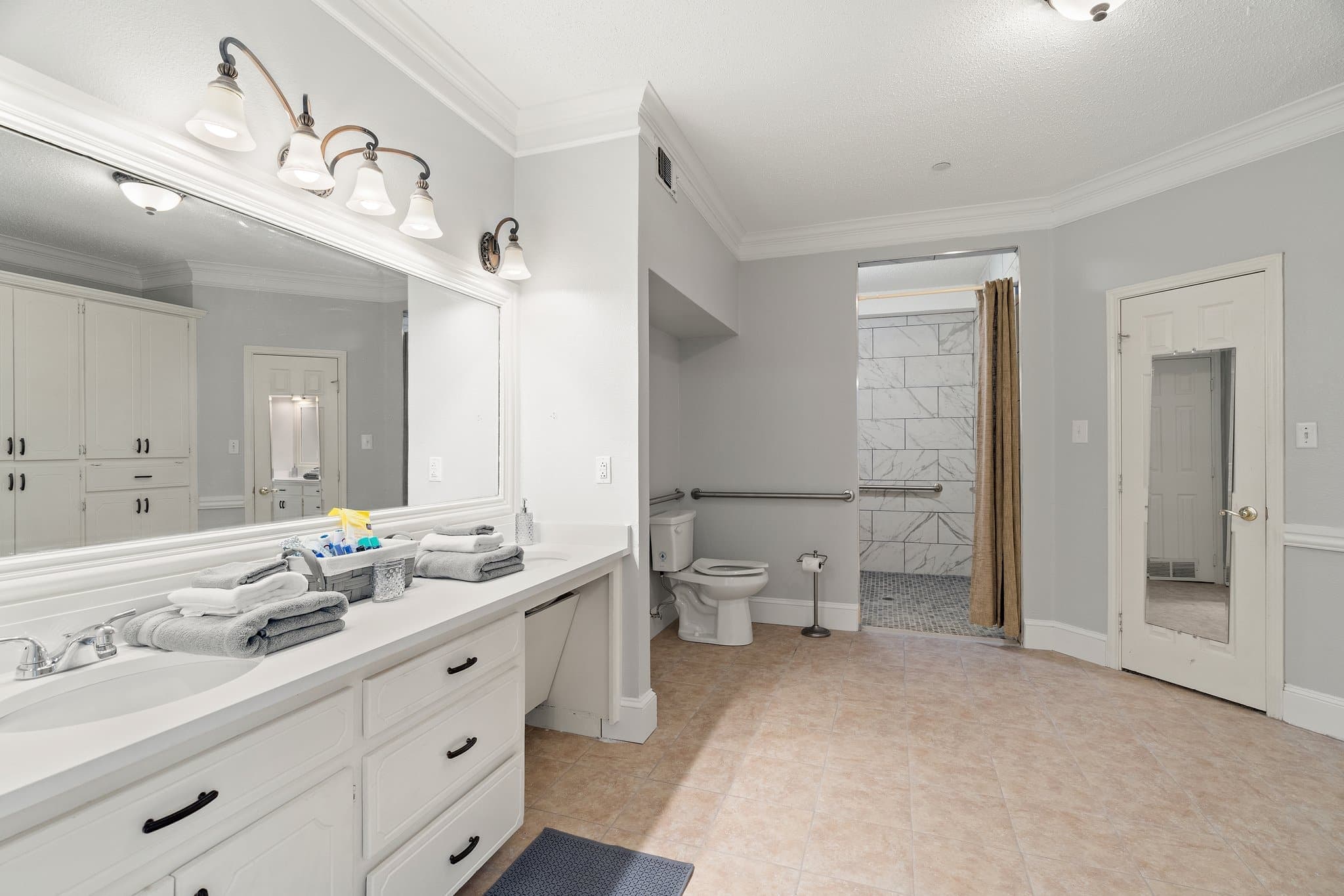 Shared bathroom with a double vanity